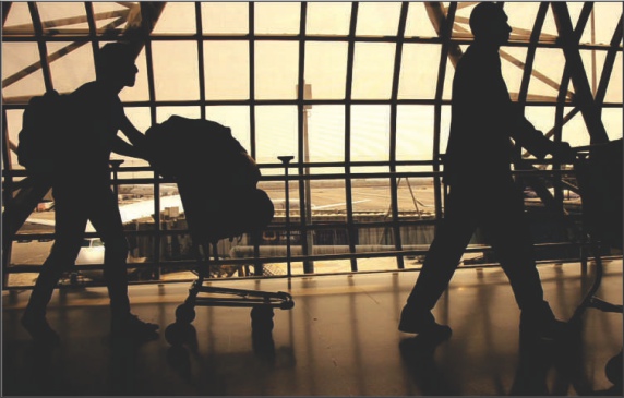 Fall2017 - Airport passenger with luggage