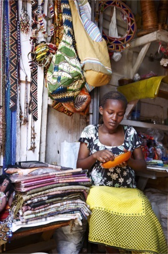 Pregnant African woman working with her hands